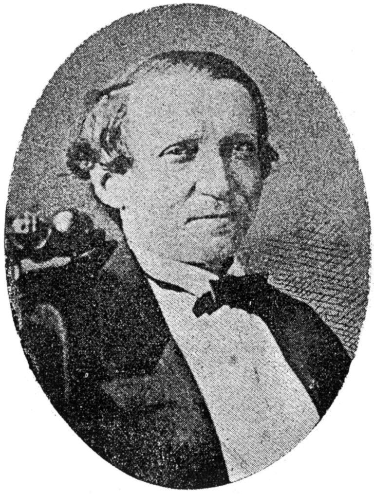 Retrato ovalado en grabado de José Morales Lemus, presidente de la Junta Cubana de Nueva York, con levita y corbatín